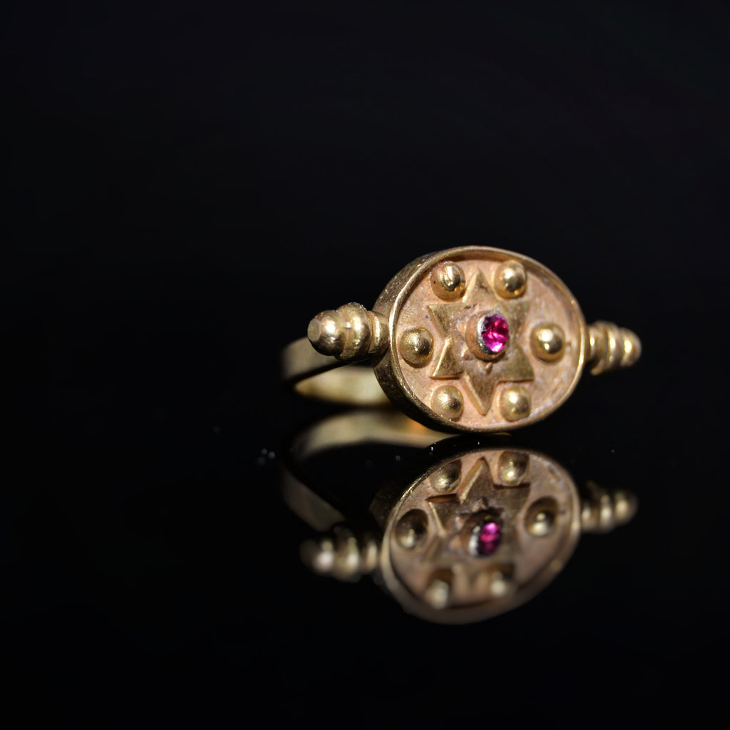 Ruby Gold Turning Ring